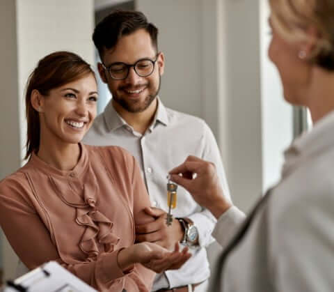 Buyers accepting home's key
