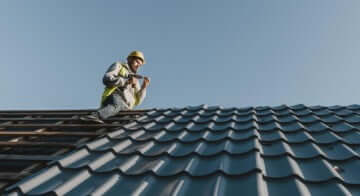 Home inspector checking roof