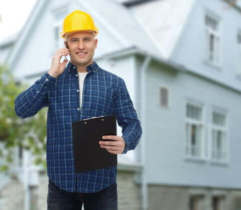 Home inspector out side home
